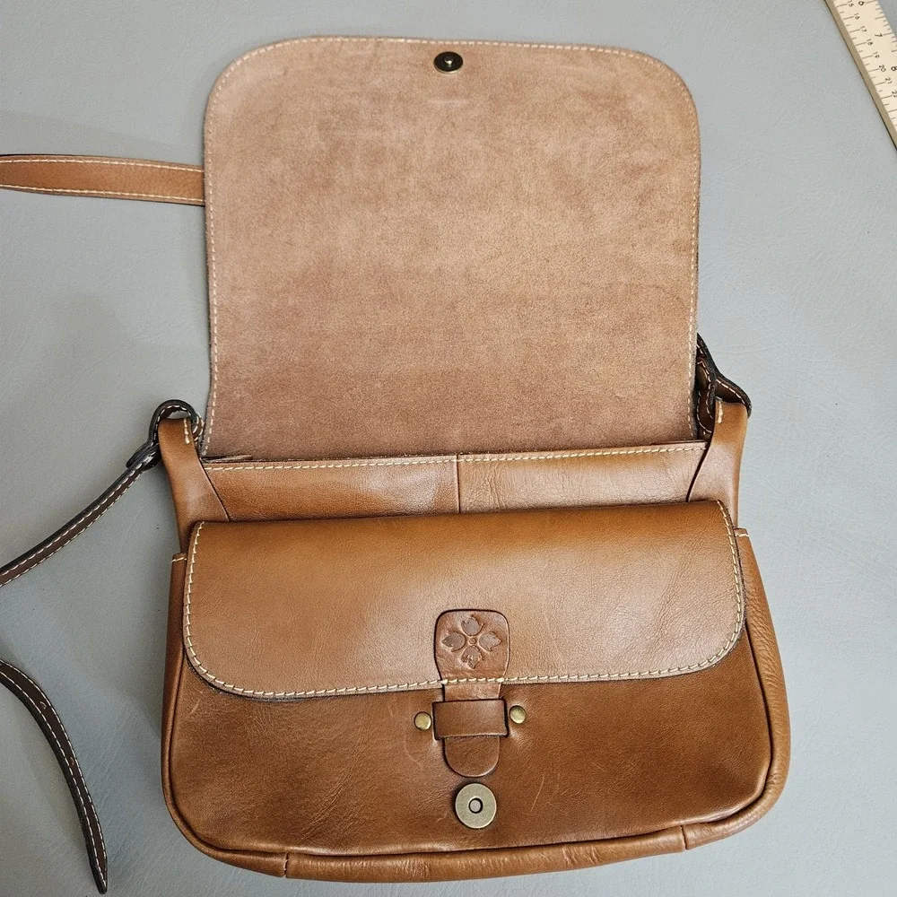 Patricia Nash Positano Saddle Bag Brown Leather Monogrammed‎ Handbag Purse